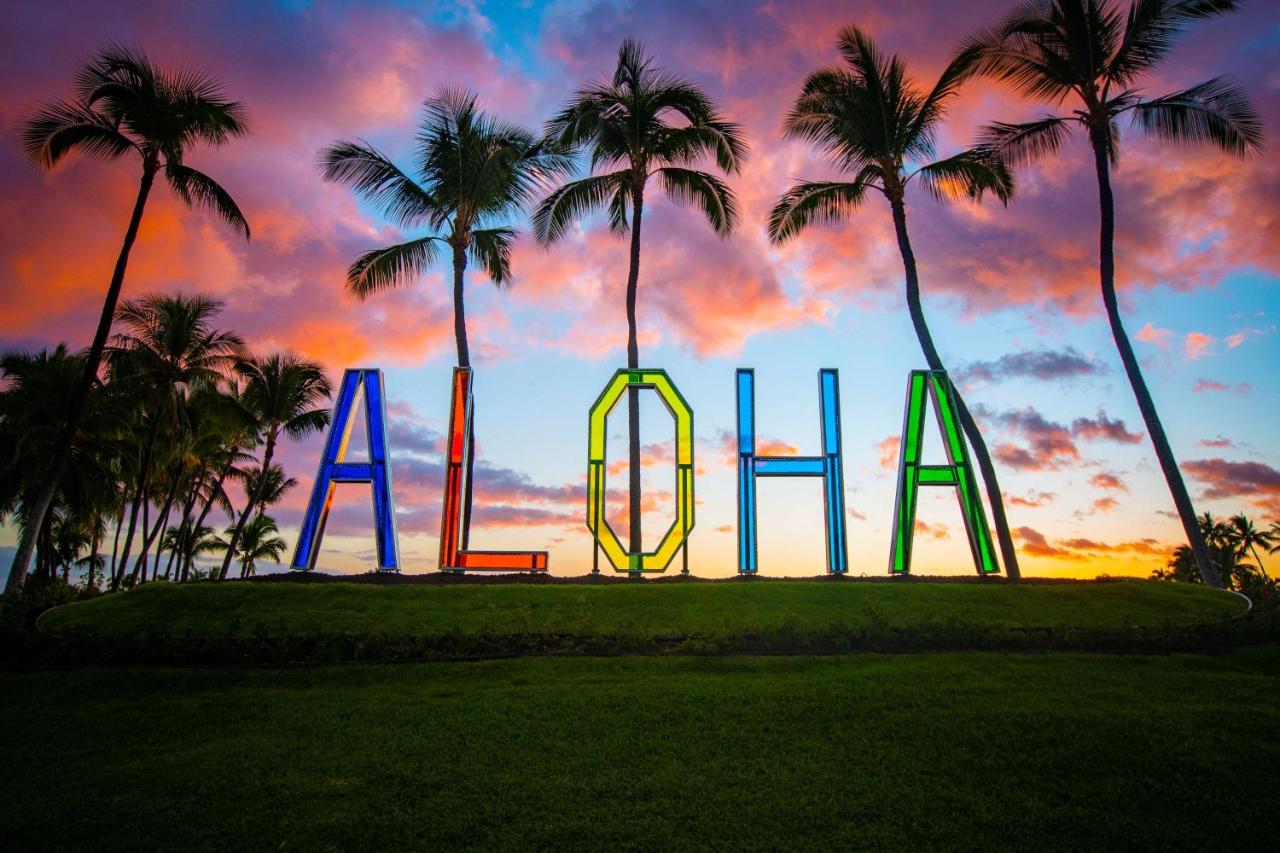 Hilton Waikoloa Village lawn with a big colorful Aloha sign