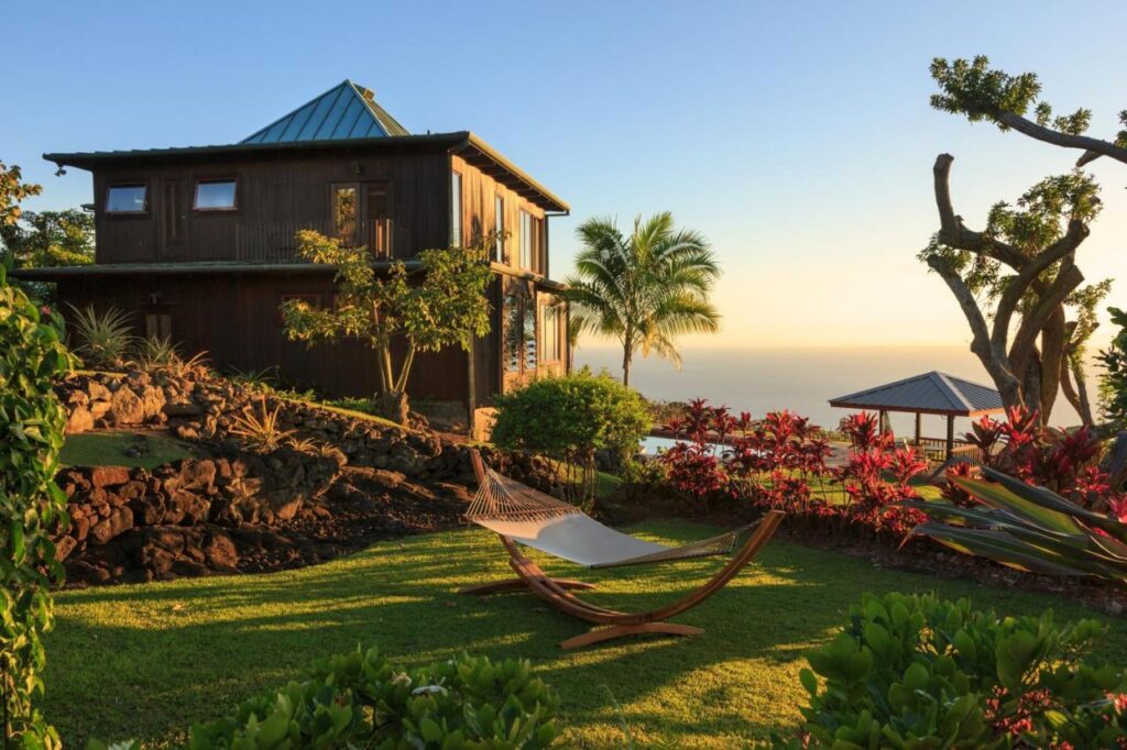 Full view of Holualoa Inn during sunset