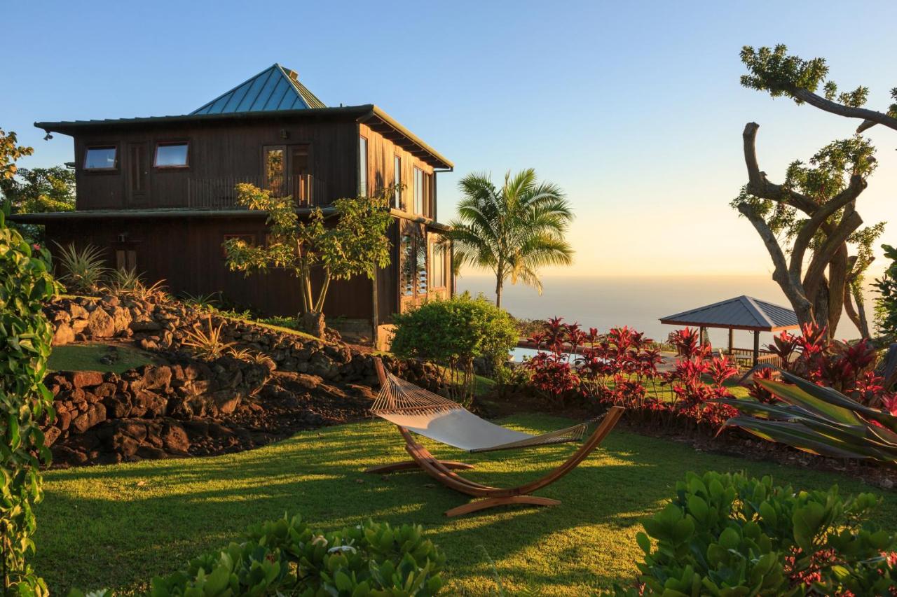 Full view of Holualoa Inn during sunset
