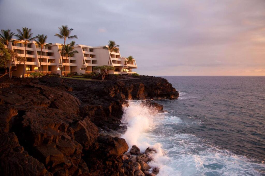 Outrigger Kona Resort & Spa against the ocean shore
