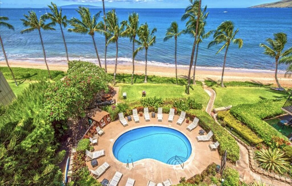 Aerial view of Kealia Resort and it's pool along the beach