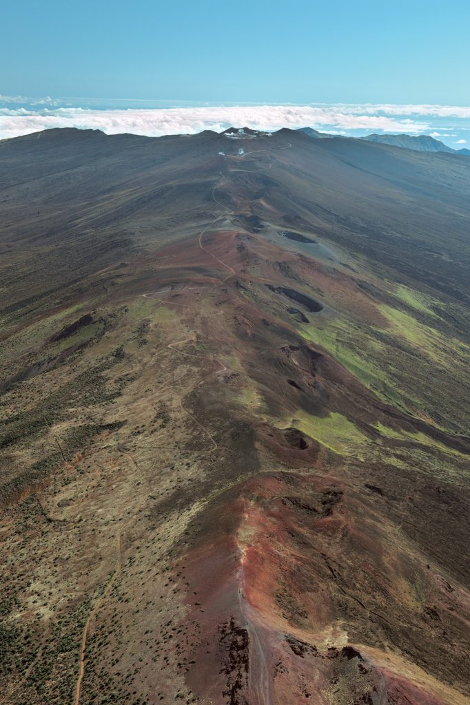 Haleakalā's Spine: A rugged ridge of volcanic rock stretching across the summit of Haleakalā, offering panoramic views of the surrounding crater and the vast expanse of Maui's landscape below.