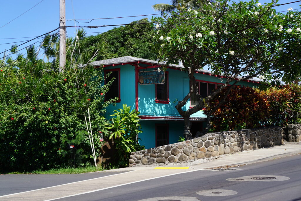 Banana Bungalow Maui Hostel on Maui's north shore that's 2 miles from Wailuku Harbor with tropical trees surrounding the Hotel