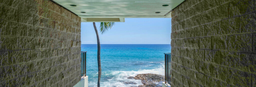 Hale Pohaku view of the beach with brick walls on the side