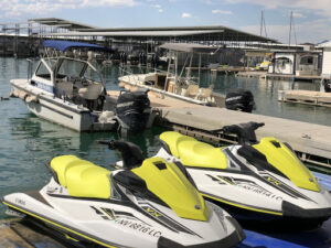 A view of Yellow and White Boats for skiing in front of the dock in the Las Vegas waters