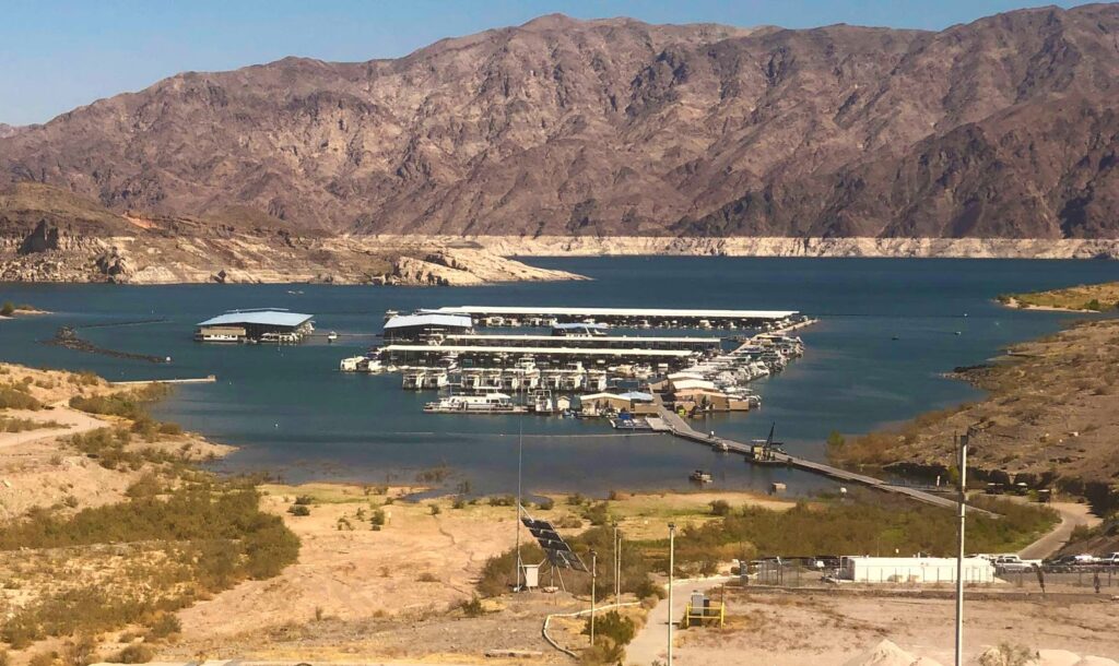 A overhead view of Lake Mead, created by the Hoover Dam on the Colorado River in the Southwestern United States, is a vast reservoir.