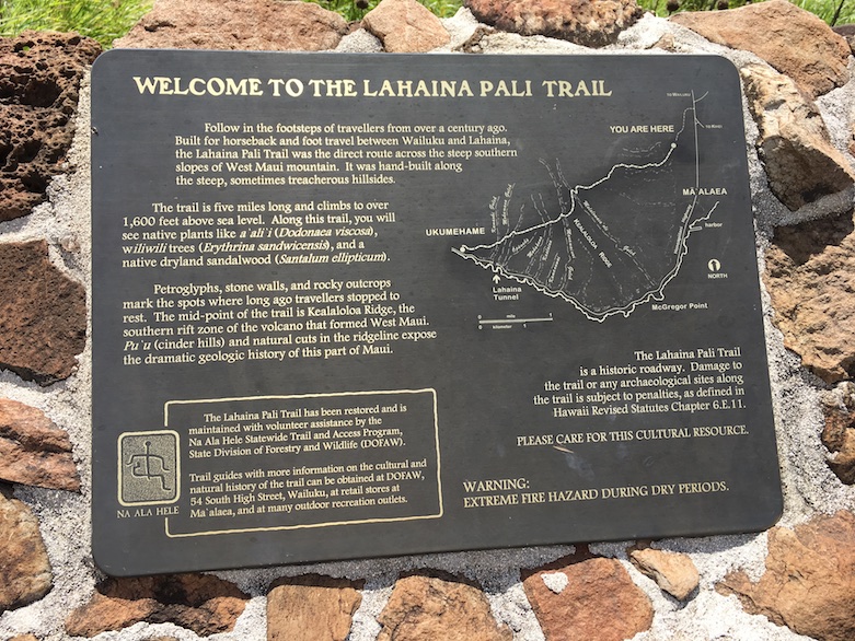 A plaque telling the history of the pali trail