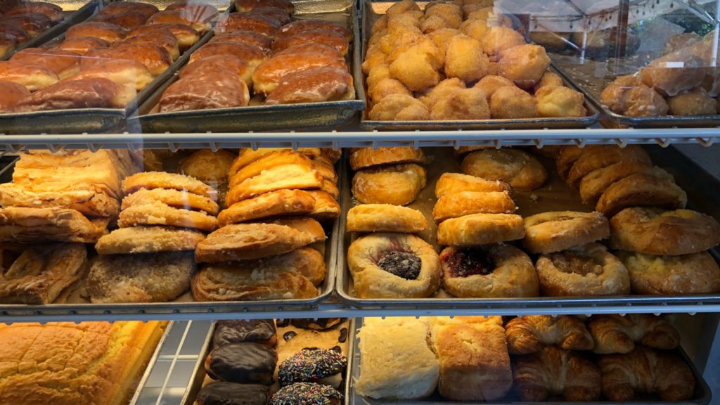 A display of various pastries being sold in Ted's Bakery, located on the North Shore of Oahu. 