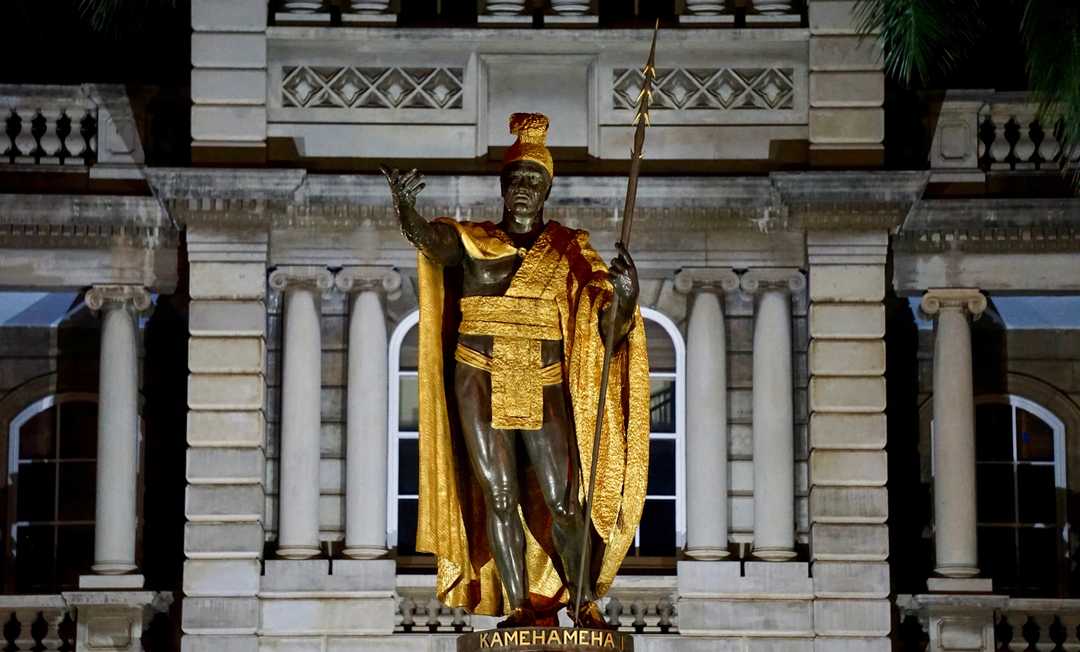 The bronze Kamehameha statue stands prominently in front of Aliʻiolani Hale in Honolulu, Hawaii