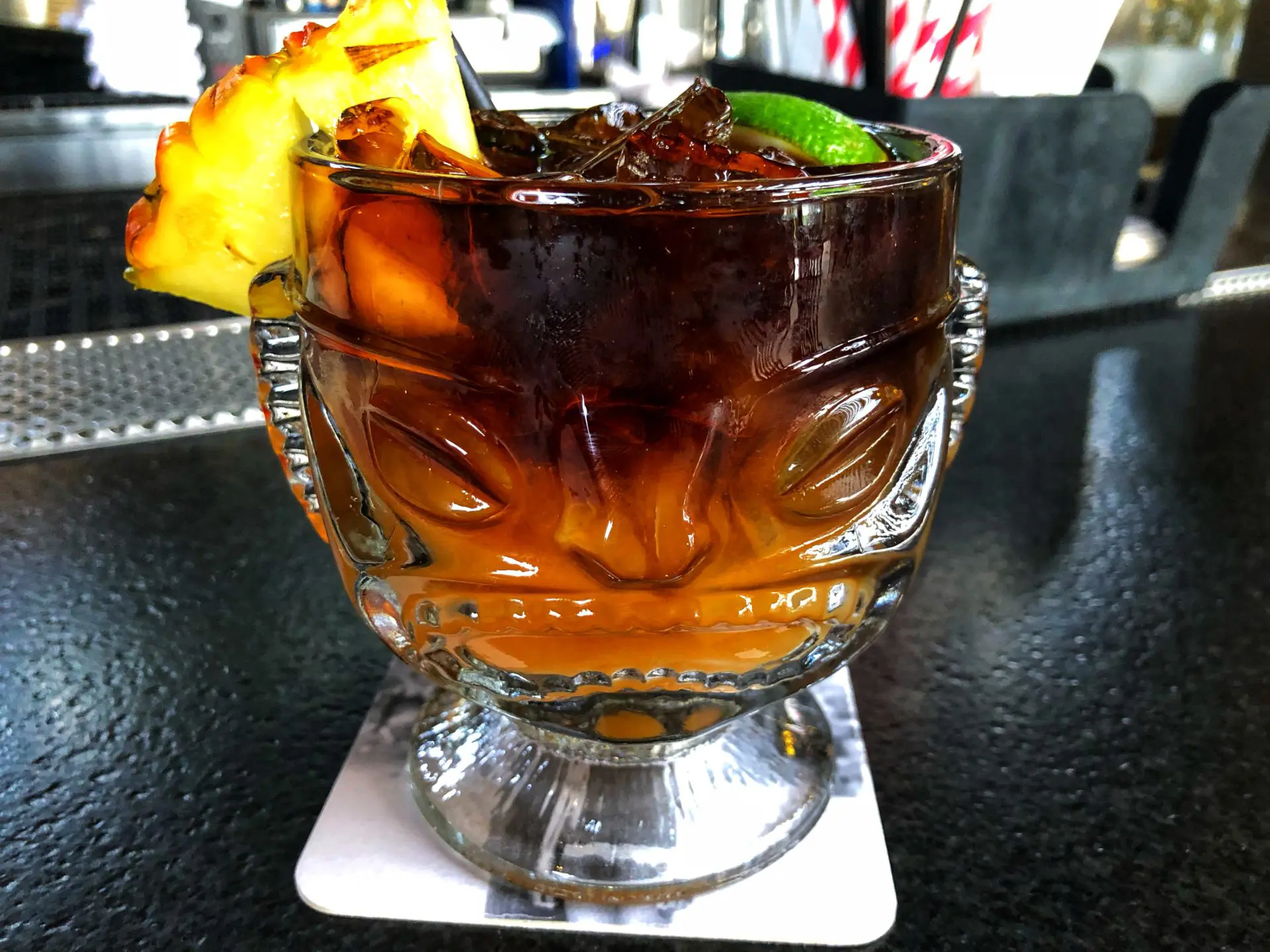 The Mai Tai recipe from the Duke: 1/2 ounce of gold rum. 3 ounces of freshly squeezed PPOG (pineapple, passion orange, guava) juice. 1.25 ounces of dark rum. Decorate with a pineapple, lime, and parasol. 