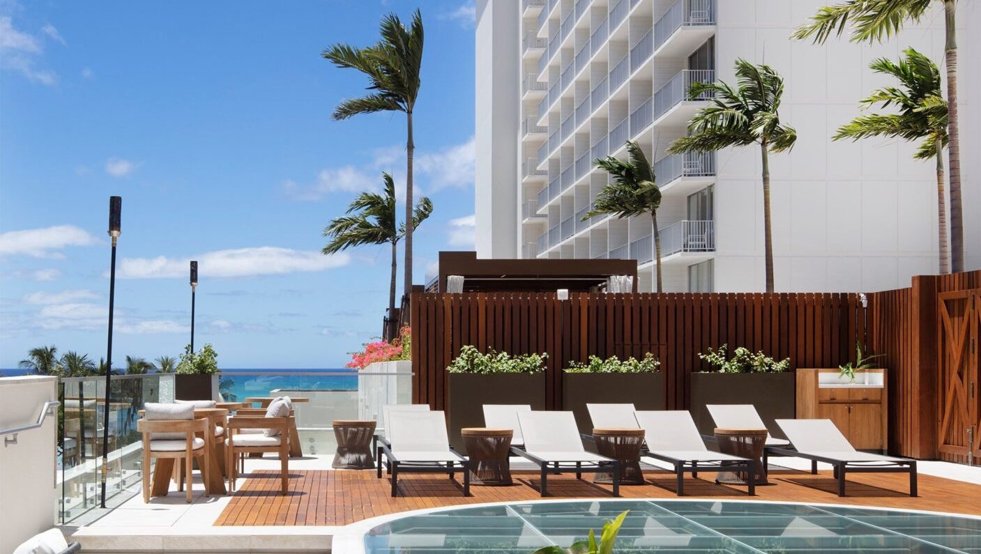Alohilani Resort Waikiki Beach poolside with waikiki beach ocean seen in the background