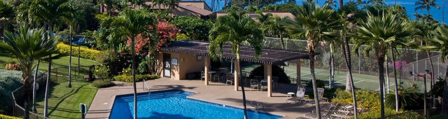 A view of Polo Beach Club pool and tennis court