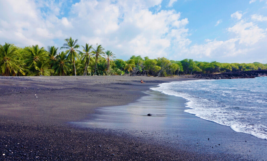 Honomalino Bay is a spacious beach in south Kona featuring stunning white and black sand. 