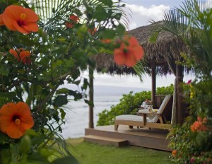 Hyatt Regency Maui Resort and Spa Beach with Hawaiian flowers in the front of view