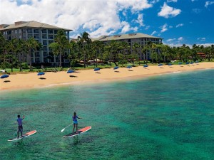 The Westin Kaanapali Ocean Resort Villas Hotel Exterior with surfers on the ocean shore in the view